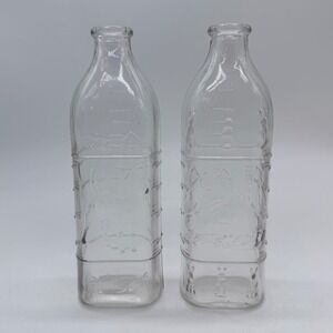 Vintage Embossed Glass Milk Bottle Dog and Rabbit Scene Set of 2